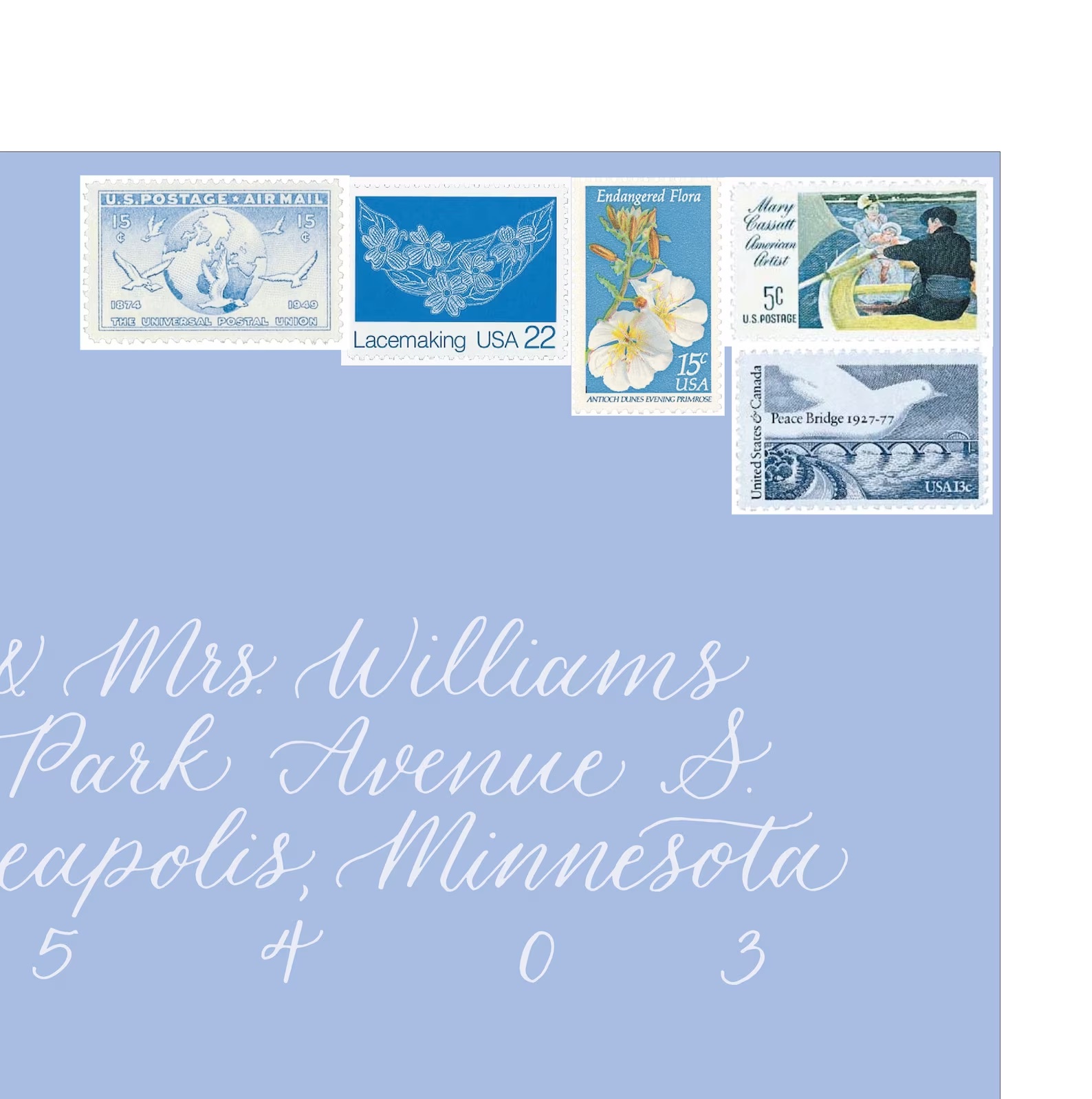 blue envelope with blue vintage postage stamps